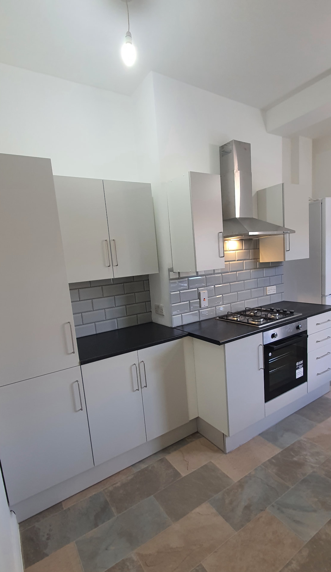 White kitchen reinstated by ATR for insurance repairs in Grays